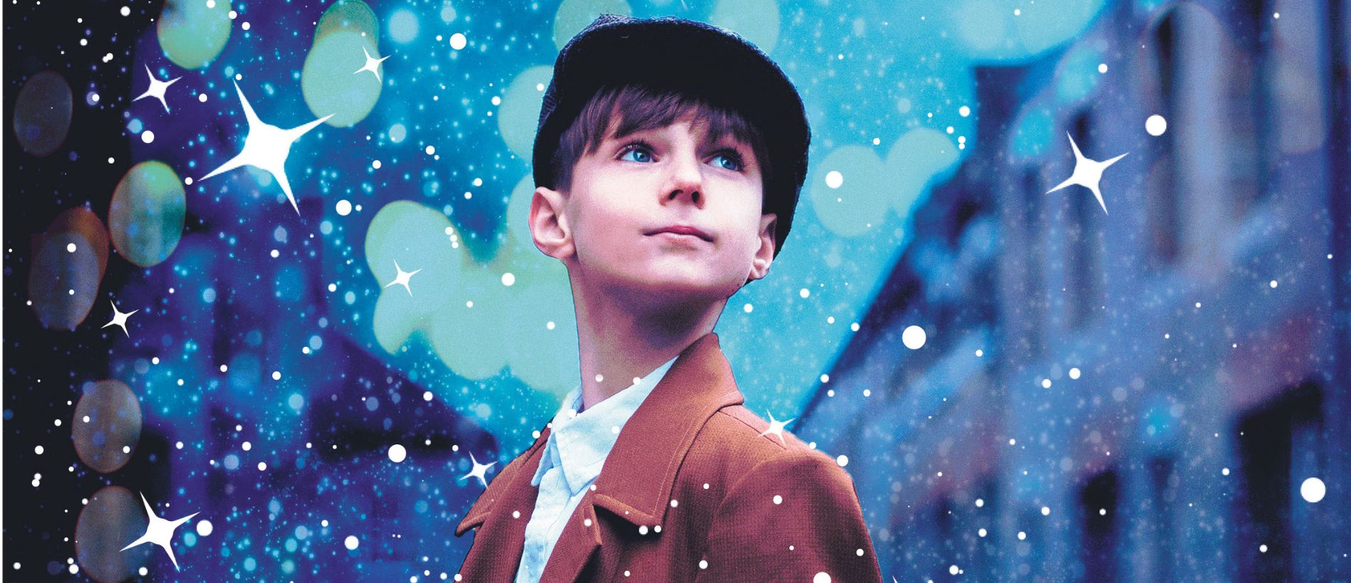 A young boy wearing a brown coat and black cap is seen looking to his left. The background is blue with green orbs and white stars spread behind him.