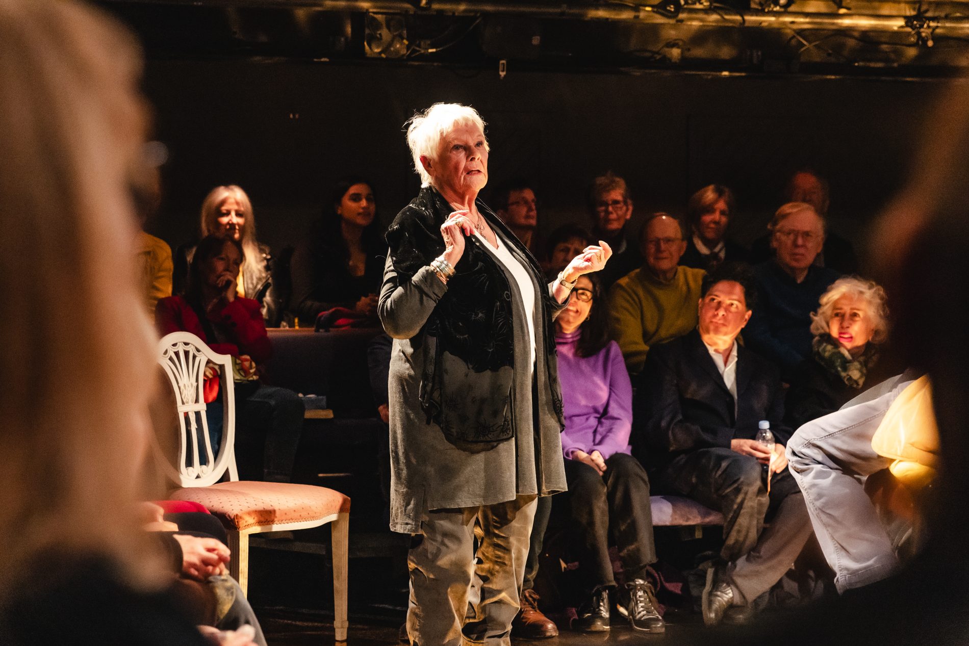 Image of Judy Dench standing in the OT